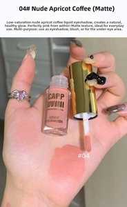 Matte liquid eyeshadow in shade 04 nude apricot, swatched on hand with applicator