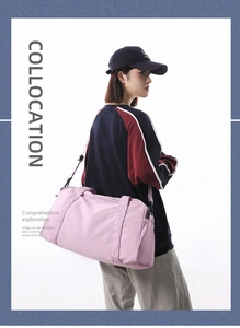 Detailed view of lightweight pink sports gym bag with adjustable strap and dual handles