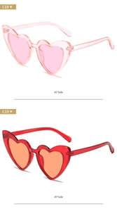 Side view detail of pink and red heart-shaped glitter sunglasses for women and kids