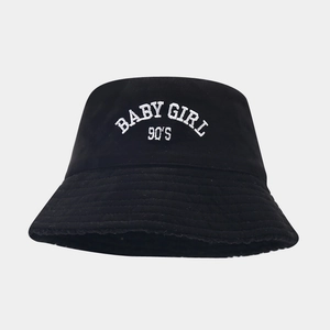 Detailed view of Baby Girl 90's white embroidery on a black suede winter bucket hat