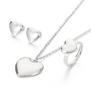 Polished silver heart jewelry set featuring necklace, ring and stud earrings on white back