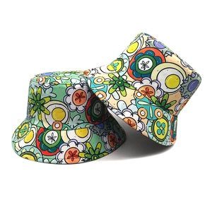 Floral bucket hats with pop art daisy prints for summer outdoor sun protection