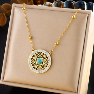 Vintage gold hollow pendant necklace with turquoise stone and sparkling small diamonds