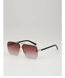 Detail of square browline sunglasses with brown gradient lenses and gold metal top bar