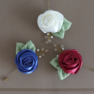 Handmade satin rose boutonnieres with pearls and pins for wedding and business suits