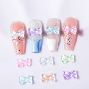 3D aurora bow nail art charms featuring iridescent colors for DIY manicure designs