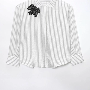 Women's white long-sleeve striped shirt with elegant black sequin bow leaf patch