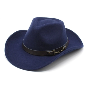 Detail of dark blue felt cowboy hat featuring brown leather band and gold horse-bit buckle