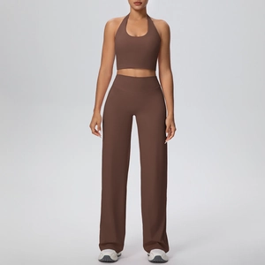 Detail of dark brown halter sports top and high-waist wide-leg pants yoga set