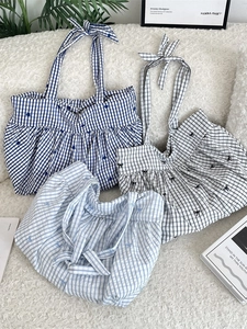 Three minimalist plaid canvas tote bags in navy, black and light blue with bow straps