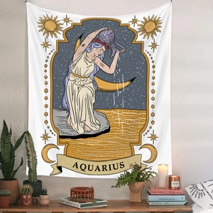 Aquarius zodiac tapestry featuring golden goddess and stars displayed on a cozy wall setting