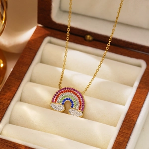 Chic gold-plated titanium necklace featuring a vibrant rainbow zircon arc pendant