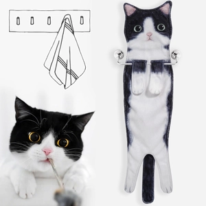 Detail showing hanging cat hand towel with hooks and realistic kitten design inspiration