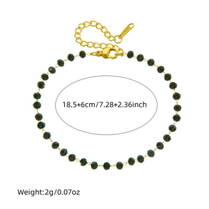 Gold stainless steel chain bracelet with black resin beads featuring size and weight data