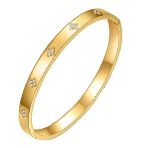 Gold plated four-leaf clover bangle with zircon accents and a polished hinge closure