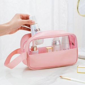 Pink portable makeup bag with PU leather, PVC window and handle for travel storage
