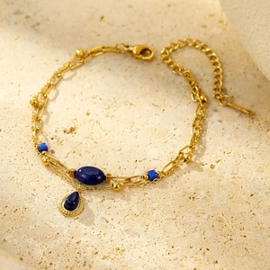 Bracelet élégant en acier doré double couche avec pendentifs en lapis-lazuli bleu