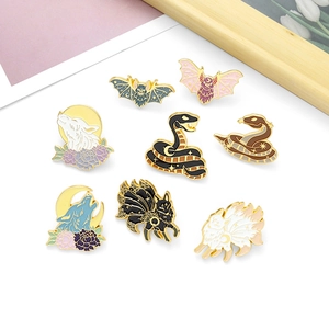 Creative animal enamel pins set featuring foxes, wolves, bats and snakes in mystical style