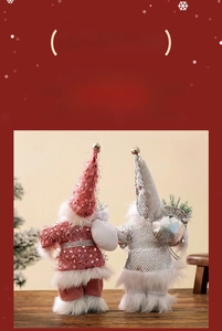 Detail of sequined 9-inch Santa Claus figurines in red and silver with festive bells