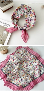 Detailed macro view of a cotton linen floral square scarf showing texture and pattern