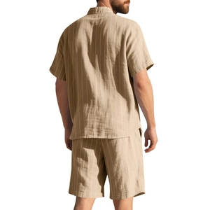 Back view of men's khaki striped linen set with short sleeve shirt and beach shorts