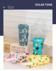 Detailed view of four colorful insulated cup bags with animal and fruit patterns