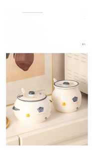 Close-up of ceramic lard tanks with lids and spoons featuring Nordic minimalist style