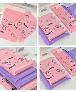 Detailed view of pink and purple cartoon bear waterproof shipping bags with self-seal strip