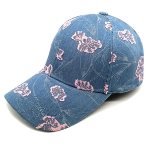 Retro blue denim baseball cap with pink floral embroidery and vintage frayed edges