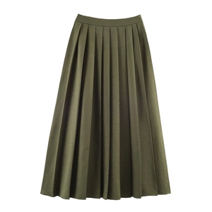 Élégante jupe plissée mi-longue vert foncé avec coupe trapèze et texture de tissu de qualité