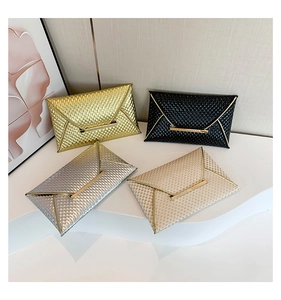 Collection of textured patent leather envelope clutch bags in gold, silver, black, and beige