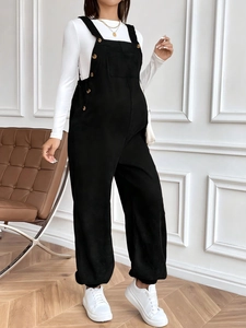 Fashionable black corduroy maternity overalls with adjustable waist and front pocket