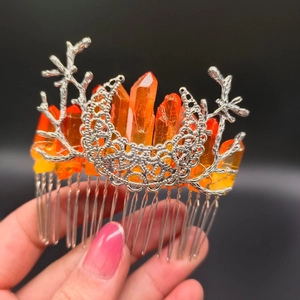 Silver crescent moon hair comb with raw orange crystal points and branch design detail