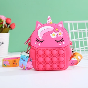Detail of pink unicorn silicone pop fidget bag with colorful rainbow crossbody strap