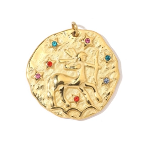Macro detail of gold 18K plated Sagittarius pendant with colorful rhinestones
