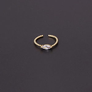 Detail of gold marquise zircon open ring featuring a unique beaded texture band