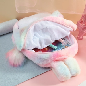 Rainbow plush cat backpack for girls featuring a fluffy texture and pompom keychain charm