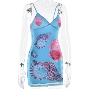 Detailed close-up of sky blue mini dress with pink seashell prints and thin straps