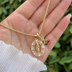 18K gold plated necklace with religious icon and cherry pendants, set with white zircons
