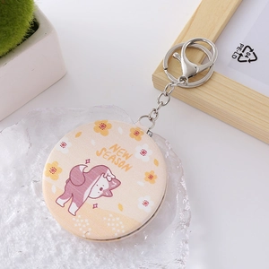 Portable folding mini makeup mirror with fabric floral pattern and metal keychain