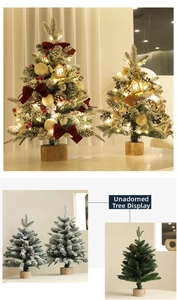 Detail of mini flocked Christmas tree with LED lights and wooden base for desk