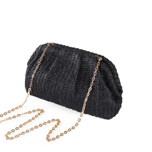 Chic black woven straw crossbody clutch with a golden chain strap and cloud bag shape