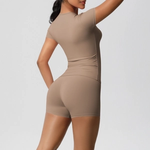 Side view of woman in high-elasticity dark khaki yoga set showing sculpting fit and fabric