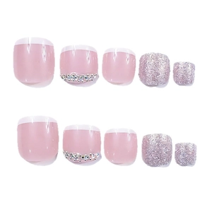 Pink French press-on toe nails with silver glitter and rhinestone accents on white background