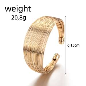 Detail view of gold multi-layer open cuff bracelet showing weight 20.8g and 6.15cm diameter
