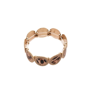 Elastic leopard print beaded bracelet with golden metal accents on white background