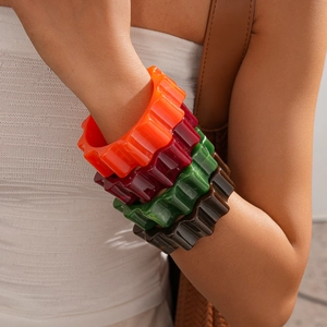 Chunky acrylic flower gear bangles in marble green, orange, and tortoiseshell style