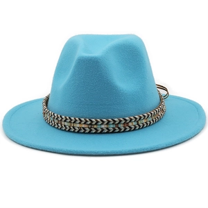 Macro detail of sky blue wool fedora hat with ethnic woven band and flat wide brim