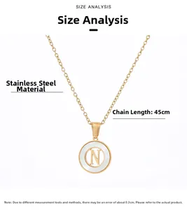 Detail of gold stainless steel necklace with letter N pearl pendant and 45cm chain length