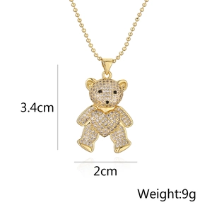 Detail showing teddy bear pendant size 3.4x2cm and weight 9g on golden bead chain